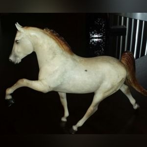 Numbered breyer horse.